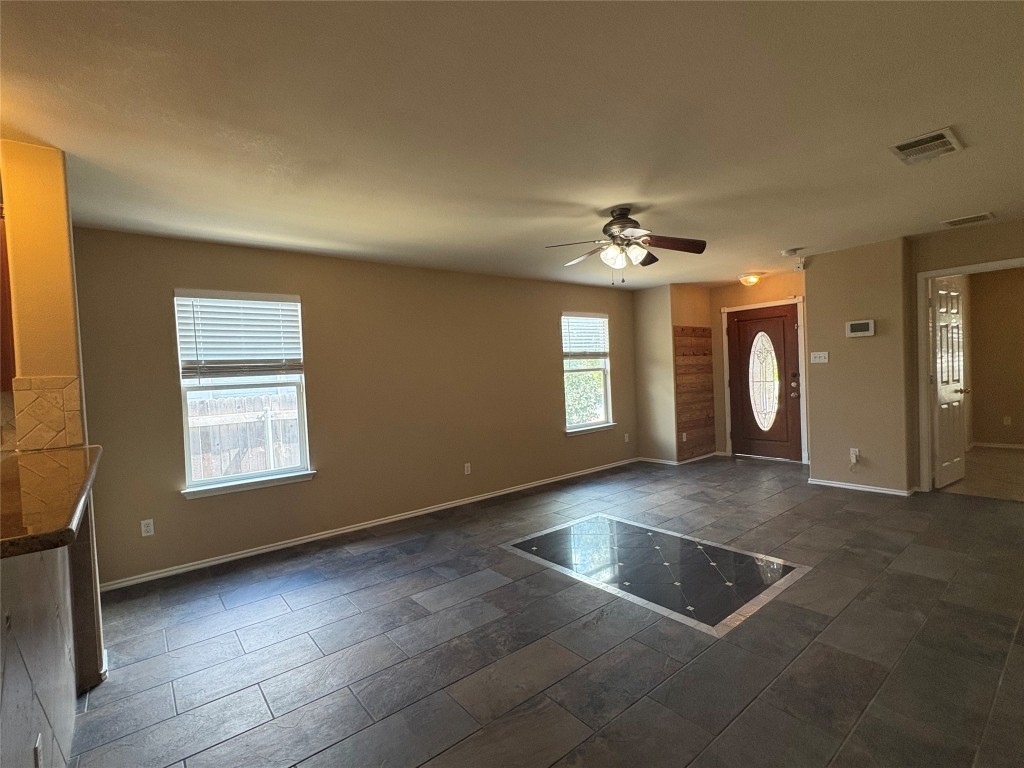 18316 Great Falls Drive Manor, TX 78653 - Photo 4 of 25 a view of a livingroom with a window