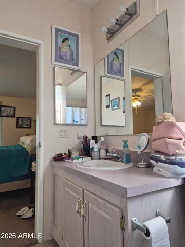 a bed room with a bed and furniture