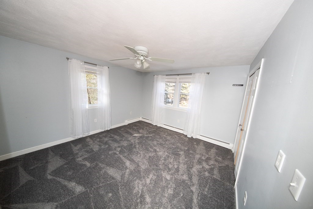 149 Salem Road Billerica, MA 01821 - Photo 13 of 21 a view of empty room with windows