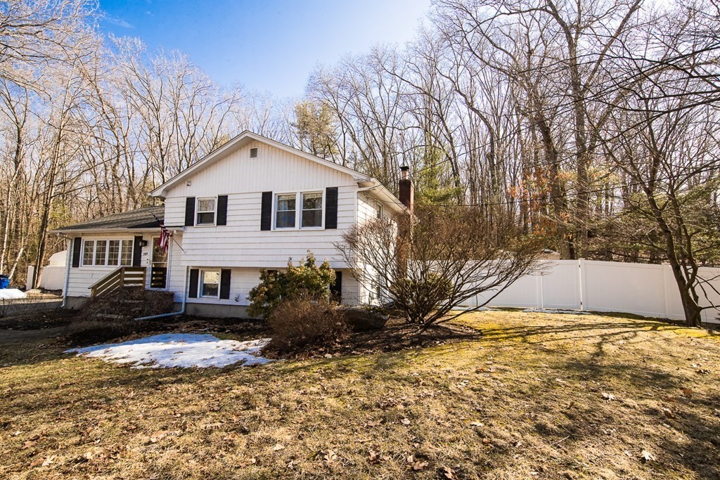 149 Salem Road Billerica, MA 01821 - Photo 3 of 21 a front view of a house with a yard