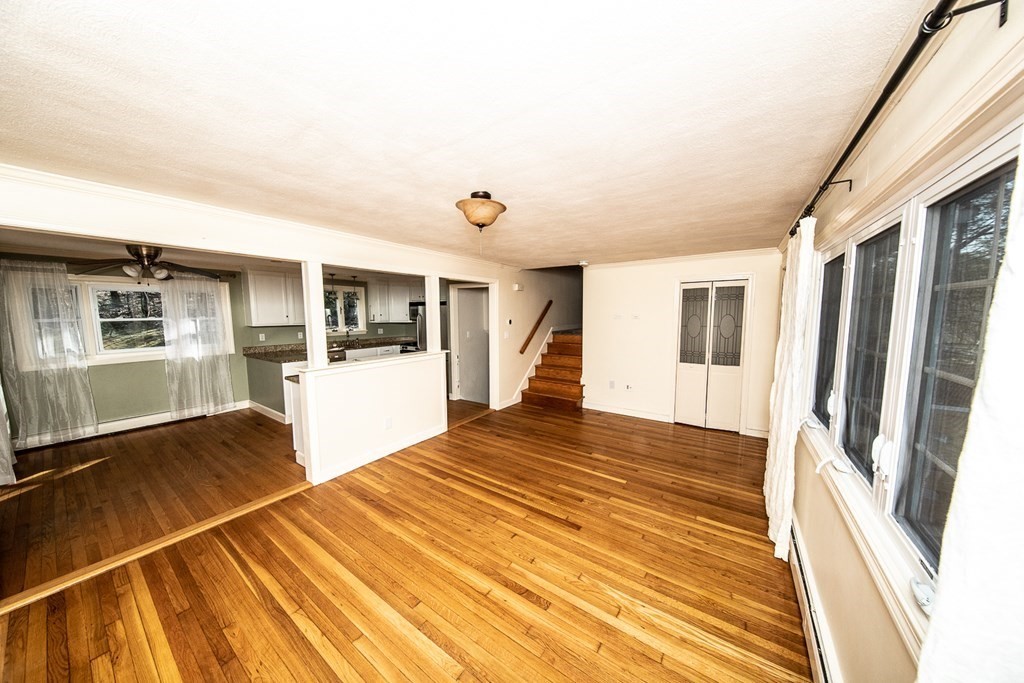 149 Salem Road Billerica, MA 01821 - Photo 10 of 21 a view of a living room with a sink and wooden floor