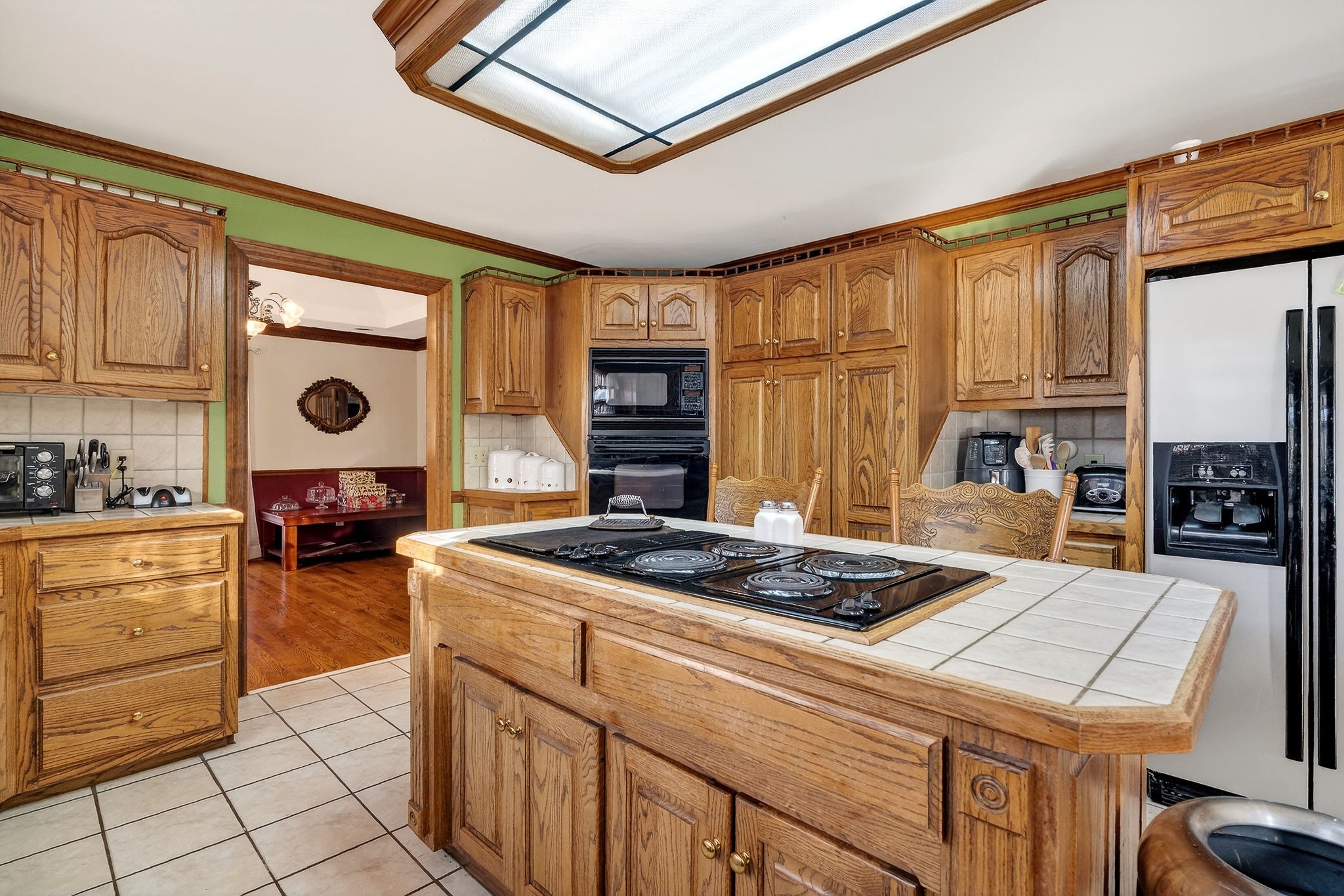 9334 Short Mountain Road Smithville, TN 37166 - Photo 13 of 51 a kitchen with a stove a sink and a refrigerator