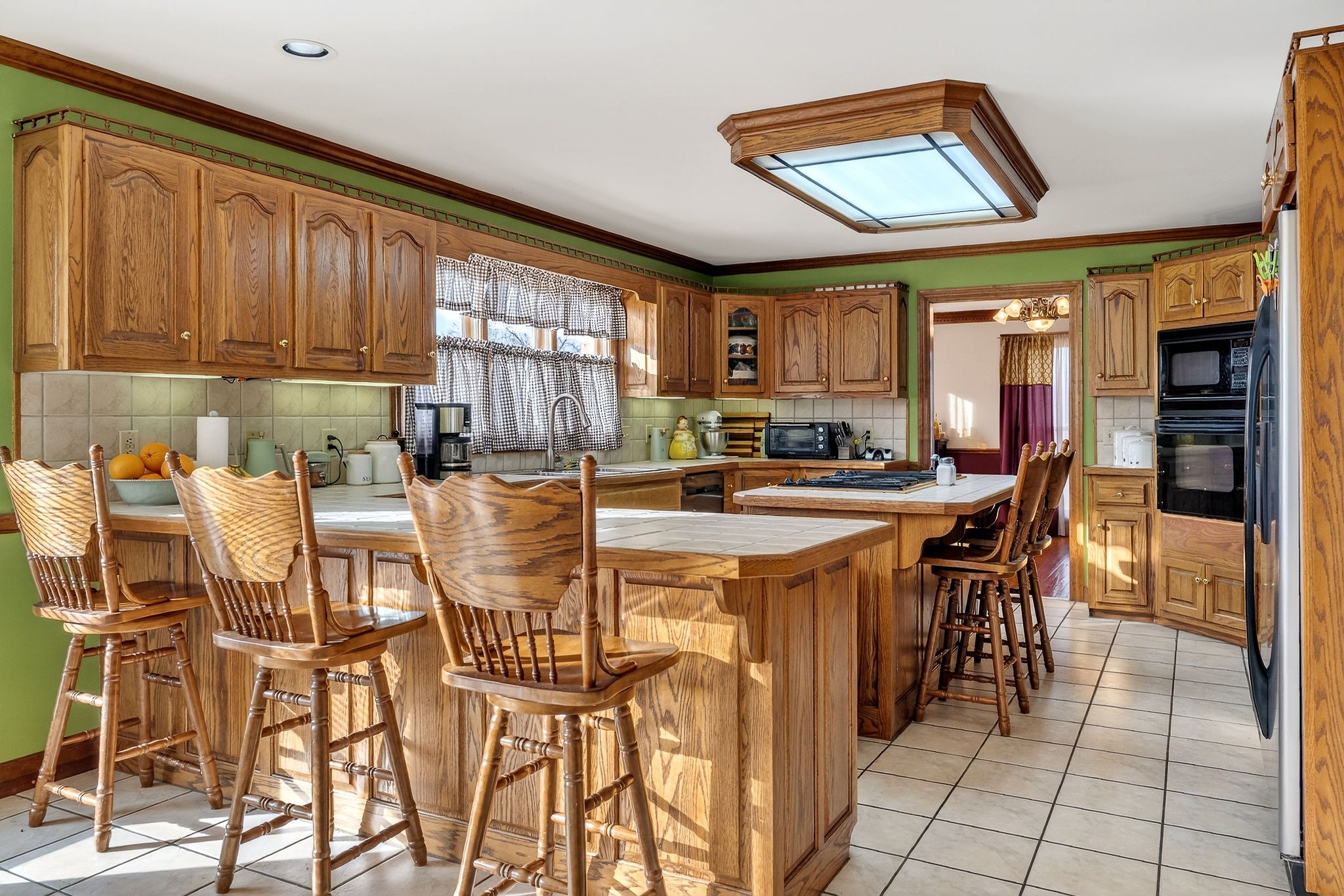 9334 Short Mountain Road Smithville, TN 37166 - Photo 16 of 51 a dinning table and chairs in a kitchen