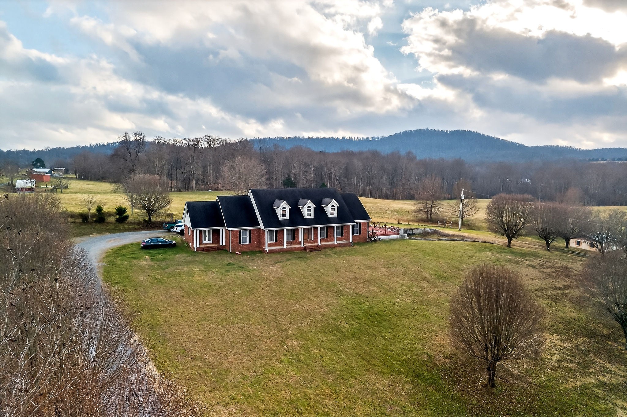 9334 Short Mountain Road Smithville, TN 37166 - Photo 46 of 51 a view of a big yard with an outdoor seating
