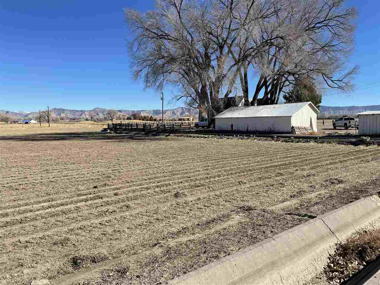 2373 I Road Grand Junction, CO 81505 - Photo 12 of 20 a large body of water with a building in the background
