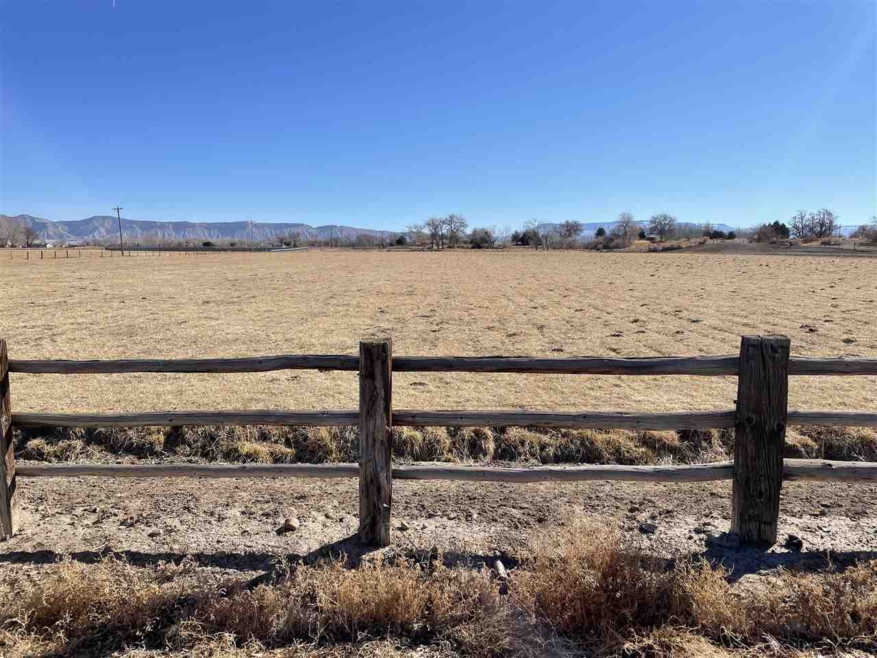 2373 I Road Grand Junction, CO 81505 - Photo 10 of 20 a view of a lake with a beach