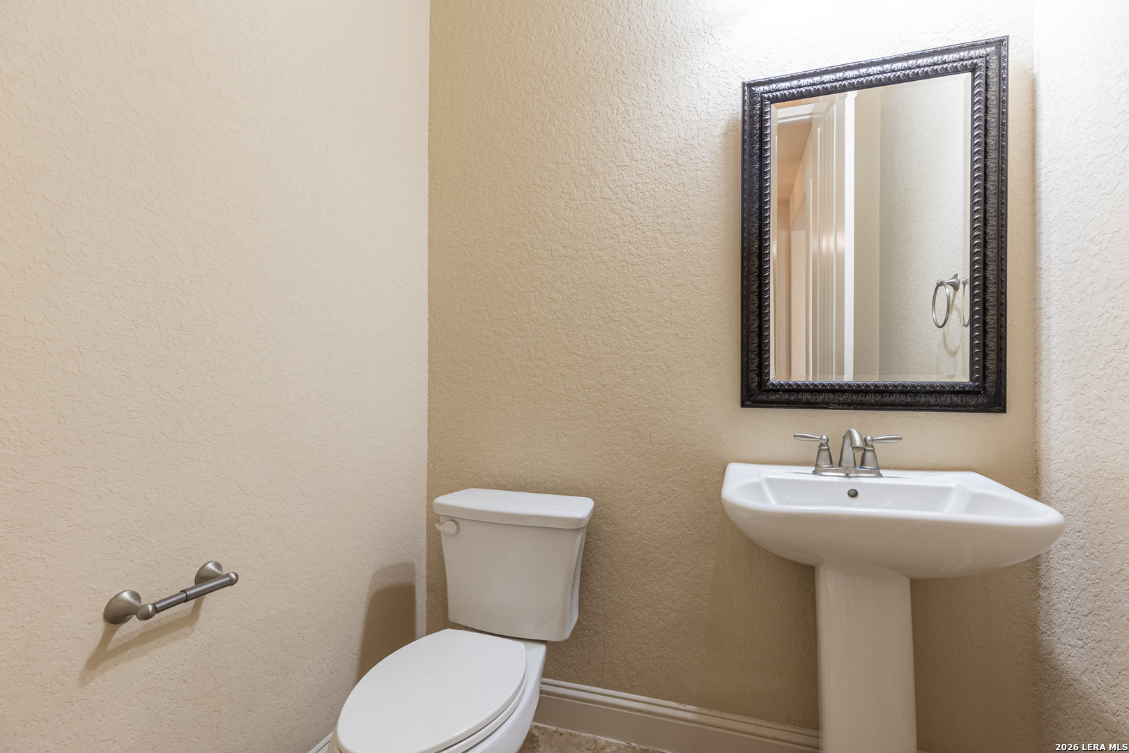 8103 Mystic Chase Boerne, TX 78015 - Photo 6 of 49 a bathroom with a sink mirror and toilet