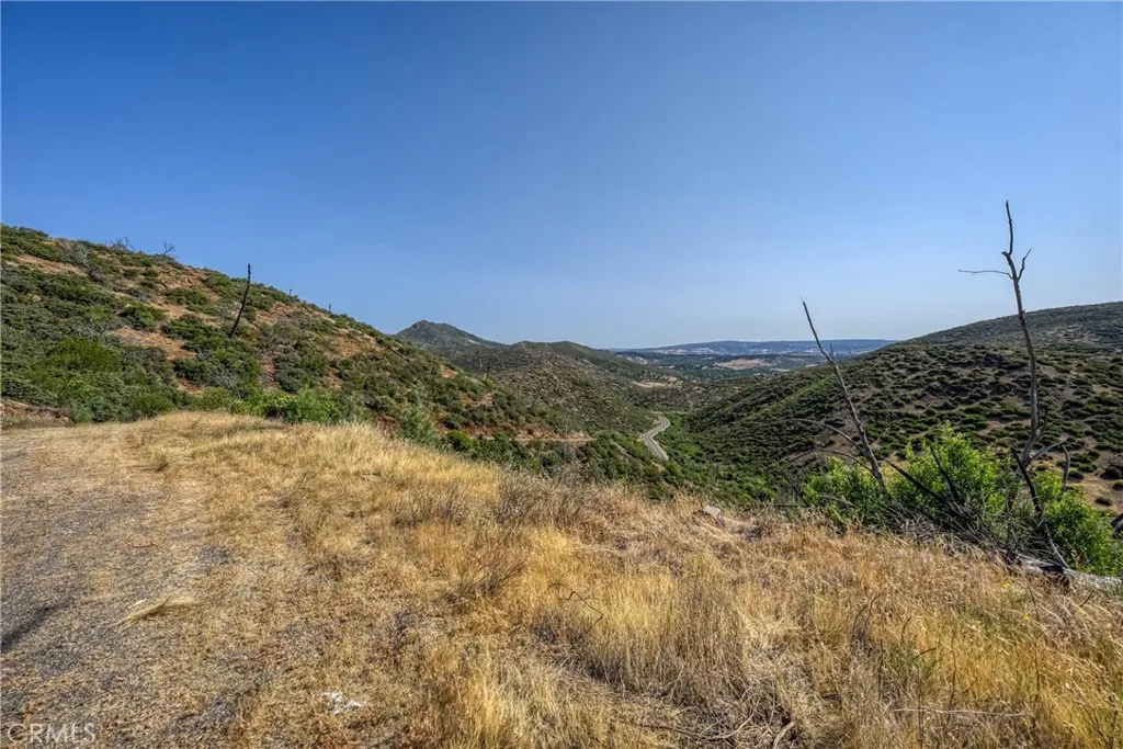 1 Butts Canyon Road Pope Valley, CA 94567 - Photo 26 of 60 a view of a field with mountains in the background