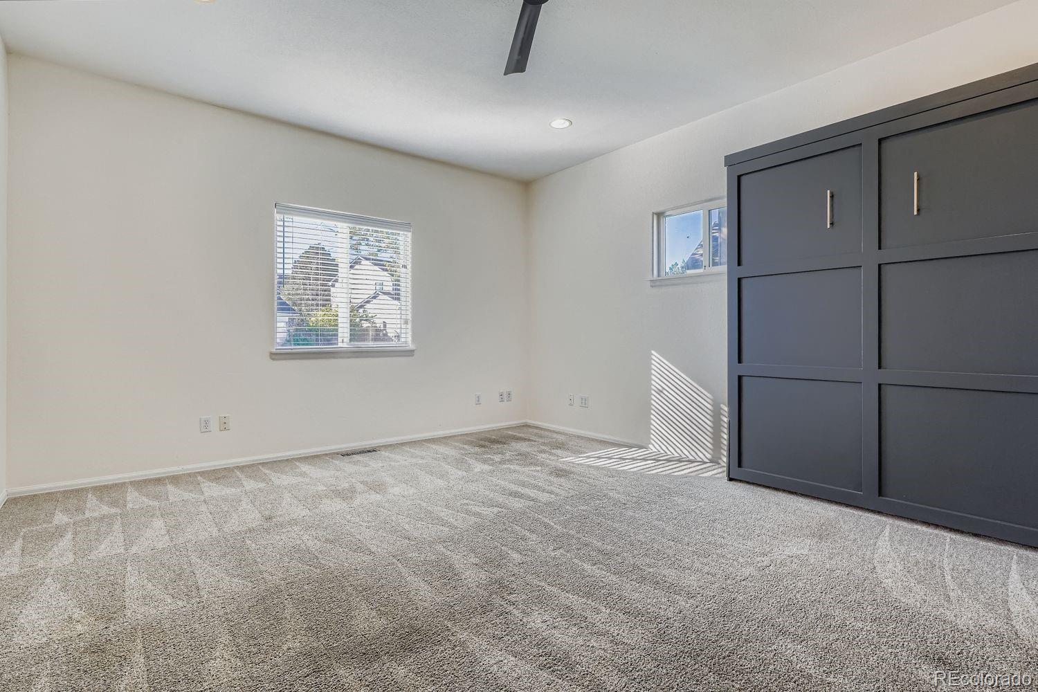 19827 East Prentice Avenue Centennial, CO 80015 - Photo 15 of 31 a view of an empty room with a window