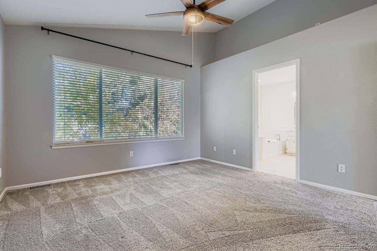 19827 East Prentice Avenue Centennial, CO 80015 - Photo 17 of 31 a view of an empty room with a window