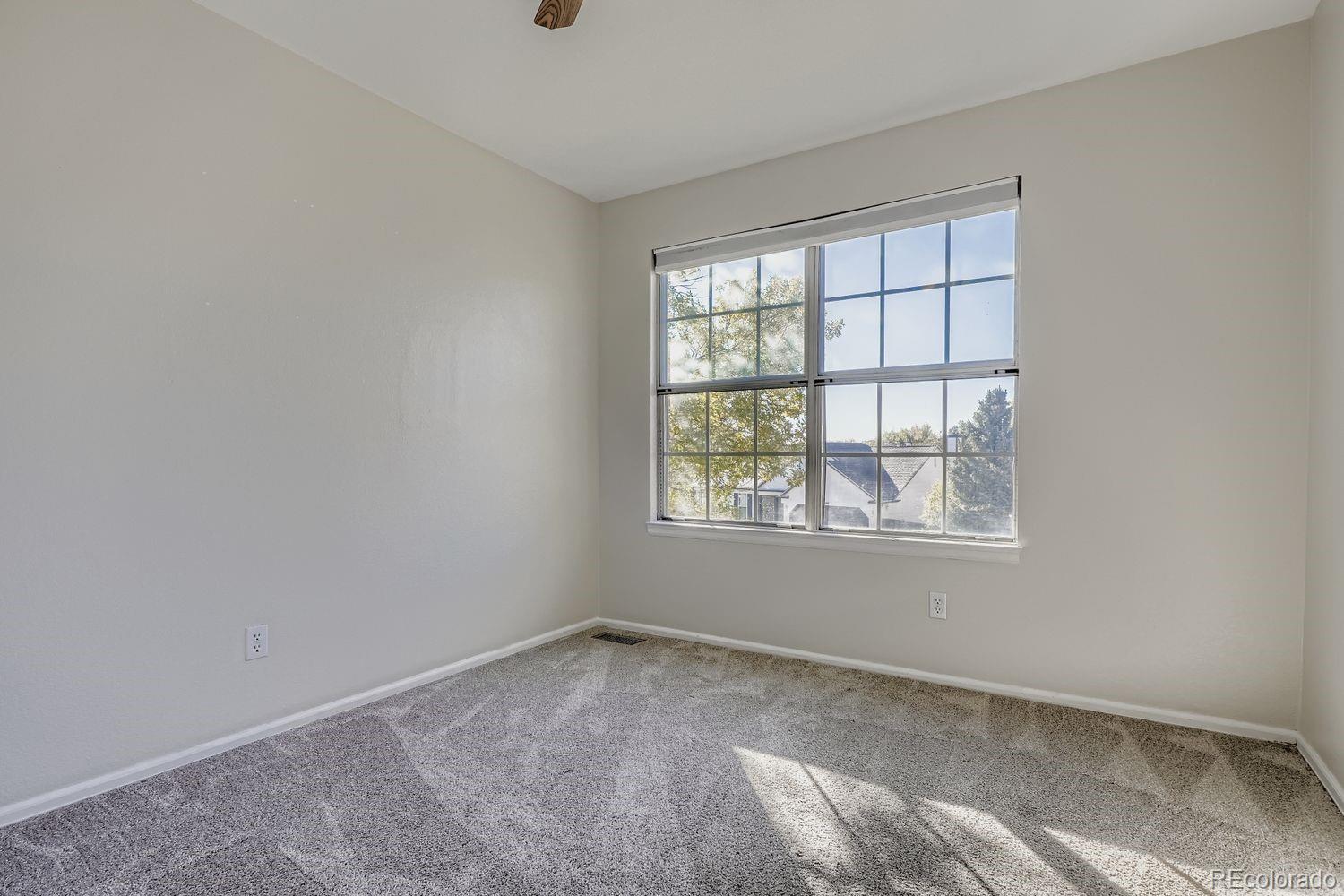 19827 East Prentice Avenue Centennial, CO 80015 - Photo 21 of 31 an empty room with a window