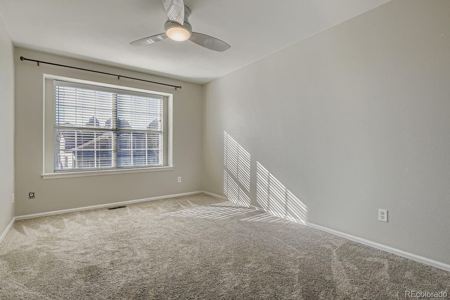19827 East Prentice Avenue Centennial, CO 80015 - Photo 22 of 31 a view of an empty room with a window