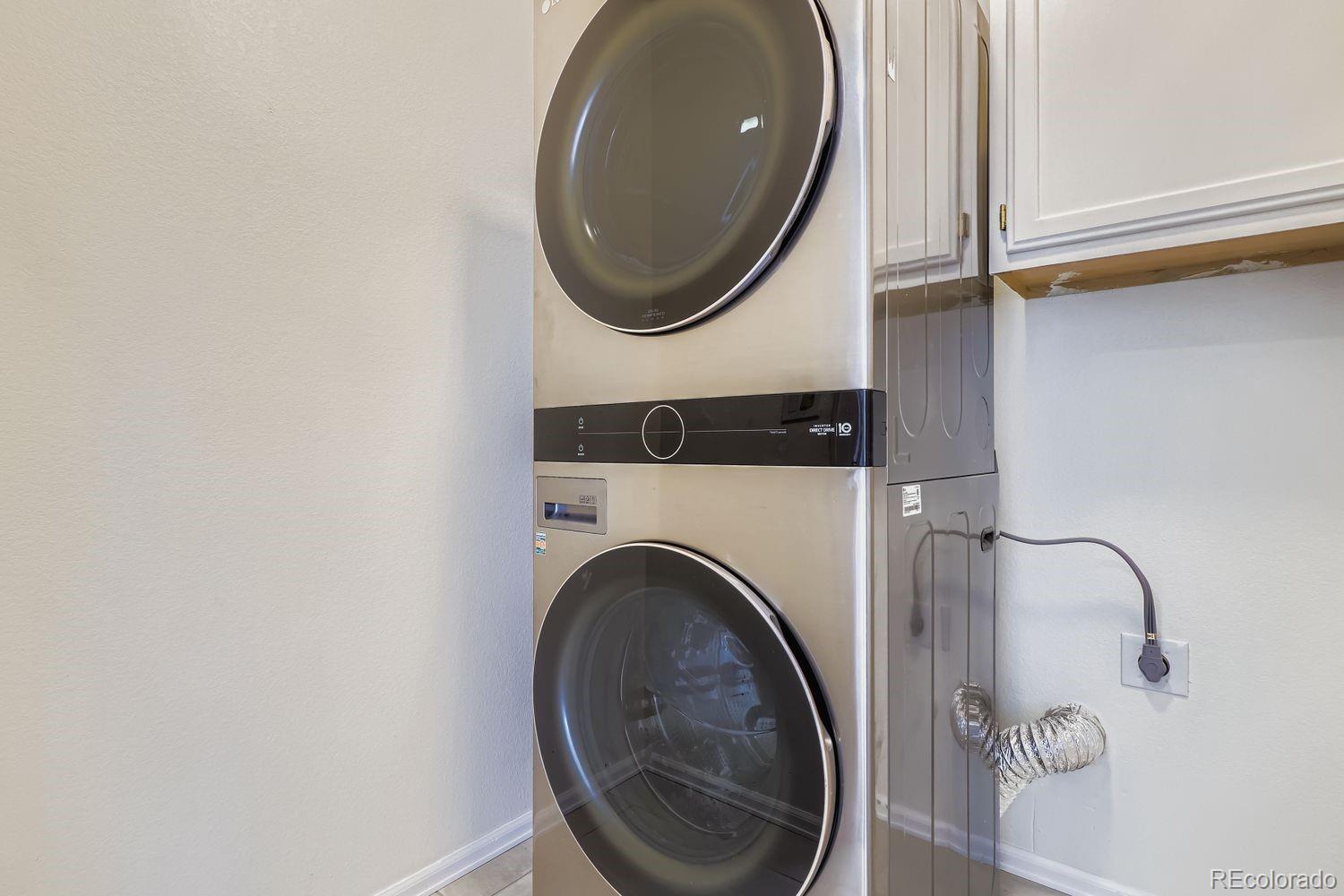 19827 East Prentice Avenue Centennial, CO 80015 - Photo 24 of 31 a bathroom with a sink mirror and vanity
