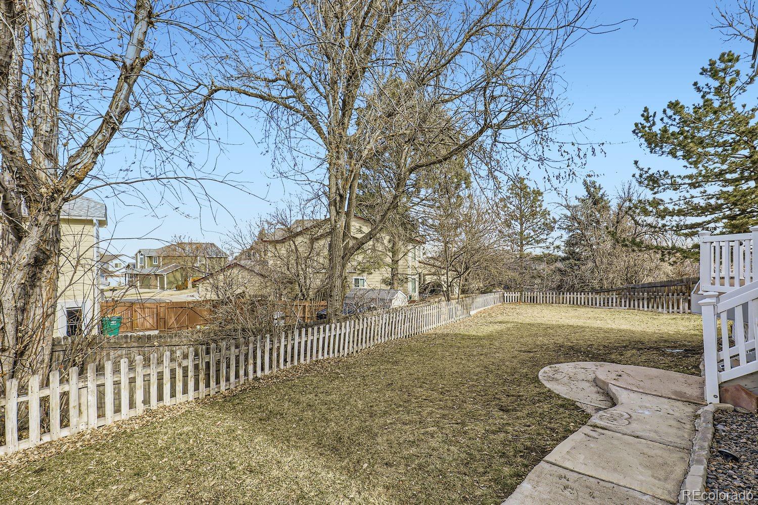 19827 East Prentice Avenue Centennial, CO 80015 - Photo 31 of 31 a view of a yard with wooden fence