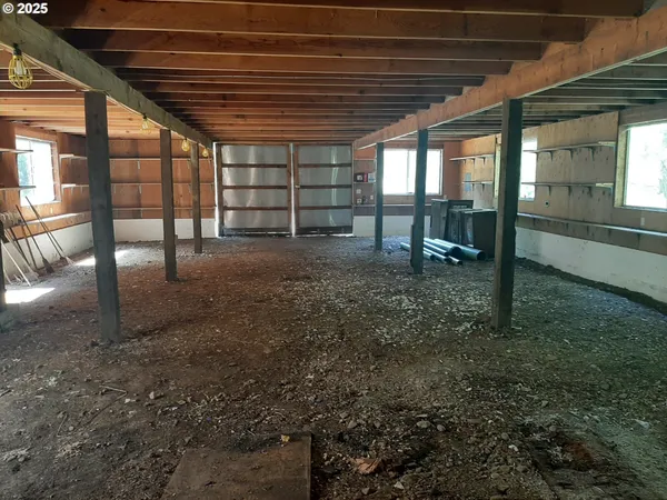 a view of an empty room with a sink