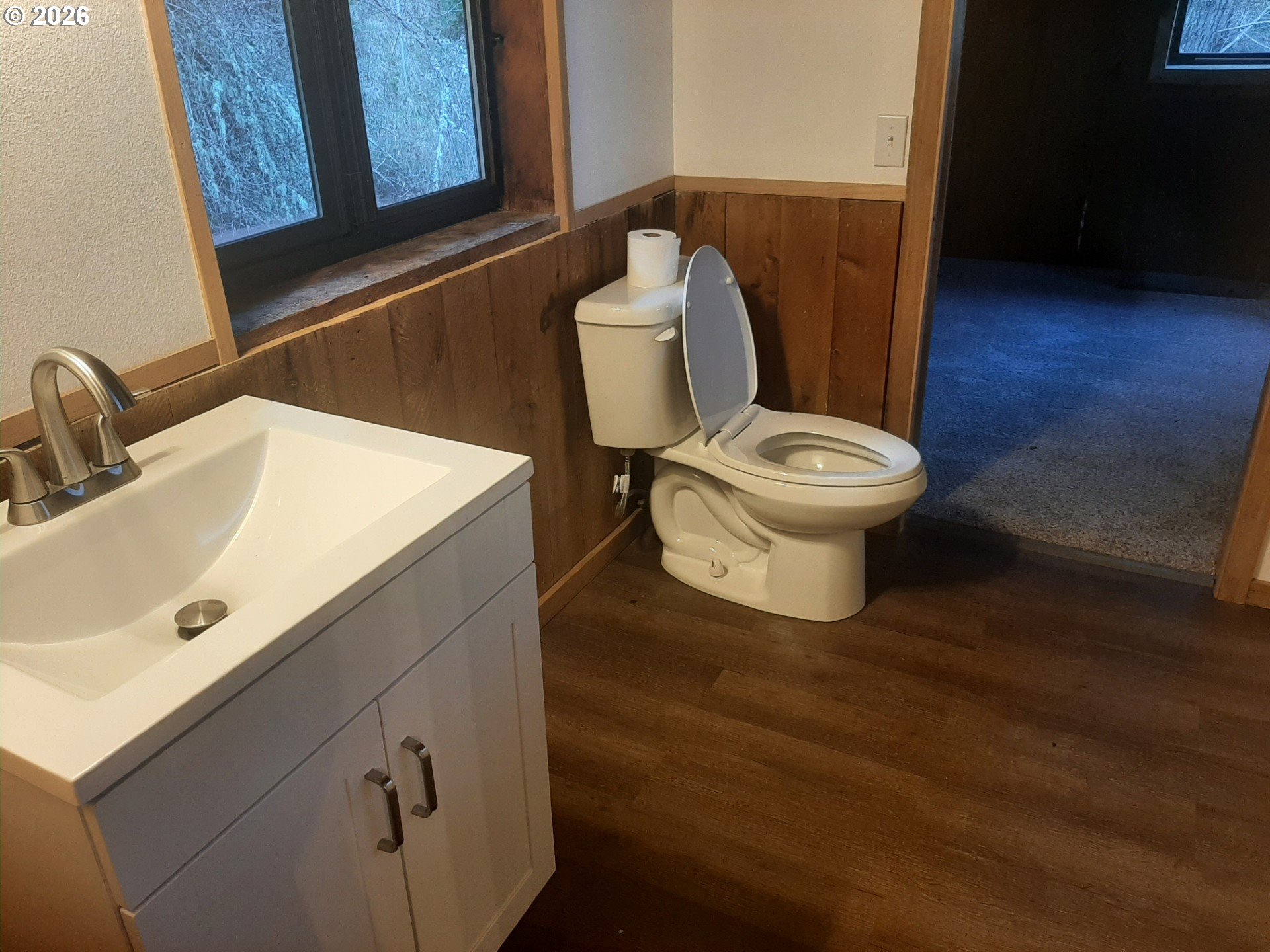 252 May Creek Road Days Creek, OR 97429 - Photo 30 of 35 a bathroom with a toilet sink and mirror