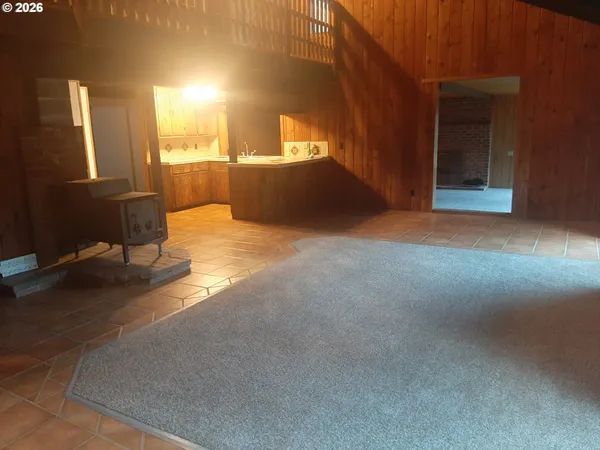 a view of empty room with windows