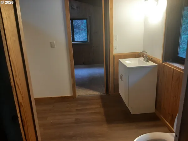 a view of an empty room with a window