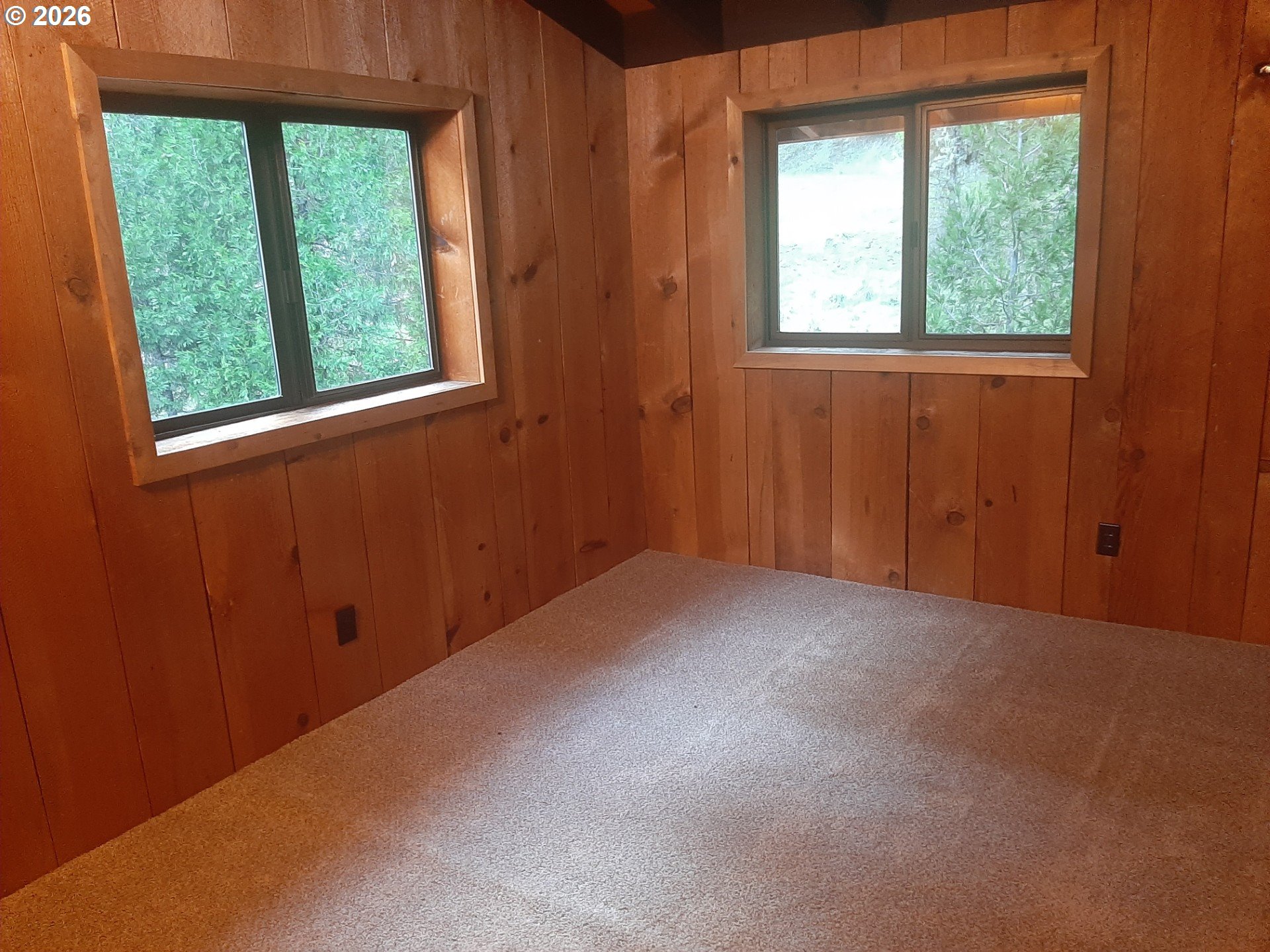 252 May Creek Road Days Creek, OR 97429 - Photo 44 of 48 an empty room with a window