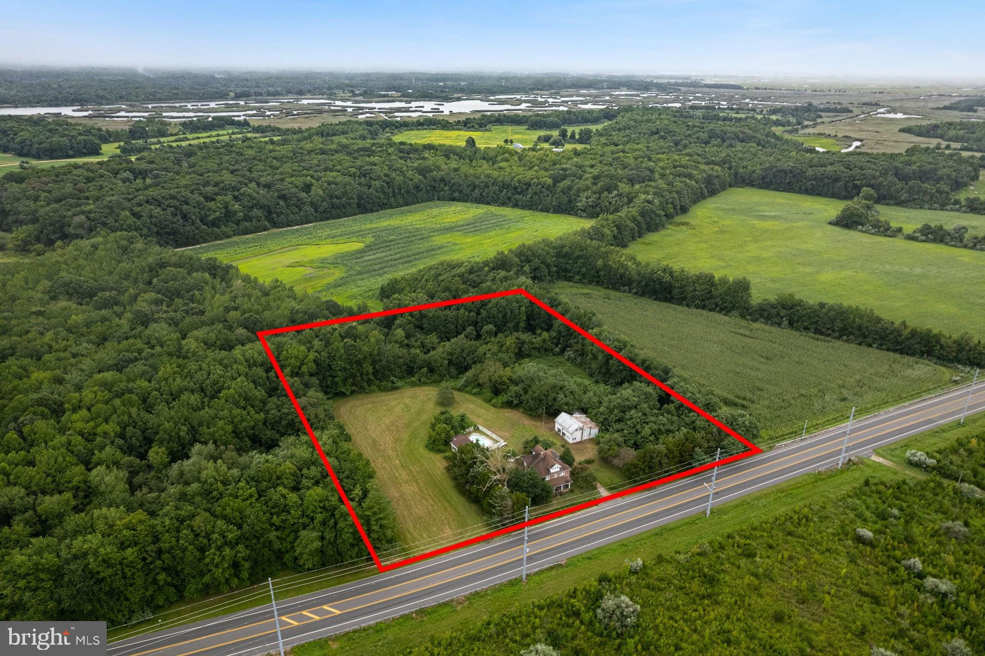 179 Alloway Creek Neck Road Salem, NJ 08079 - Photo 3 of 9 a view of a field with an ocean view