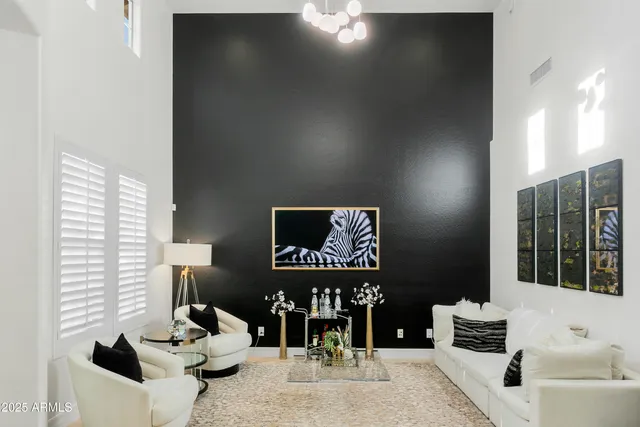 a view of a lobby with chair and tables