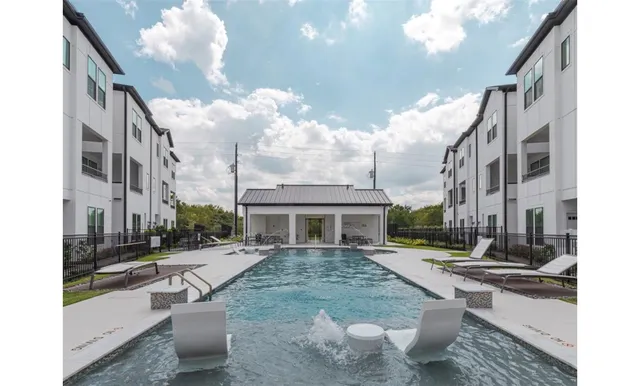 a view of a yard in front of a building