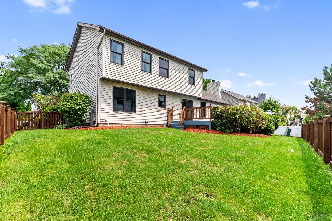 1715 Chestnut Hill Road Plainfield, IL 60586 - Photo 2 of 16 a front view of house with yard and green space