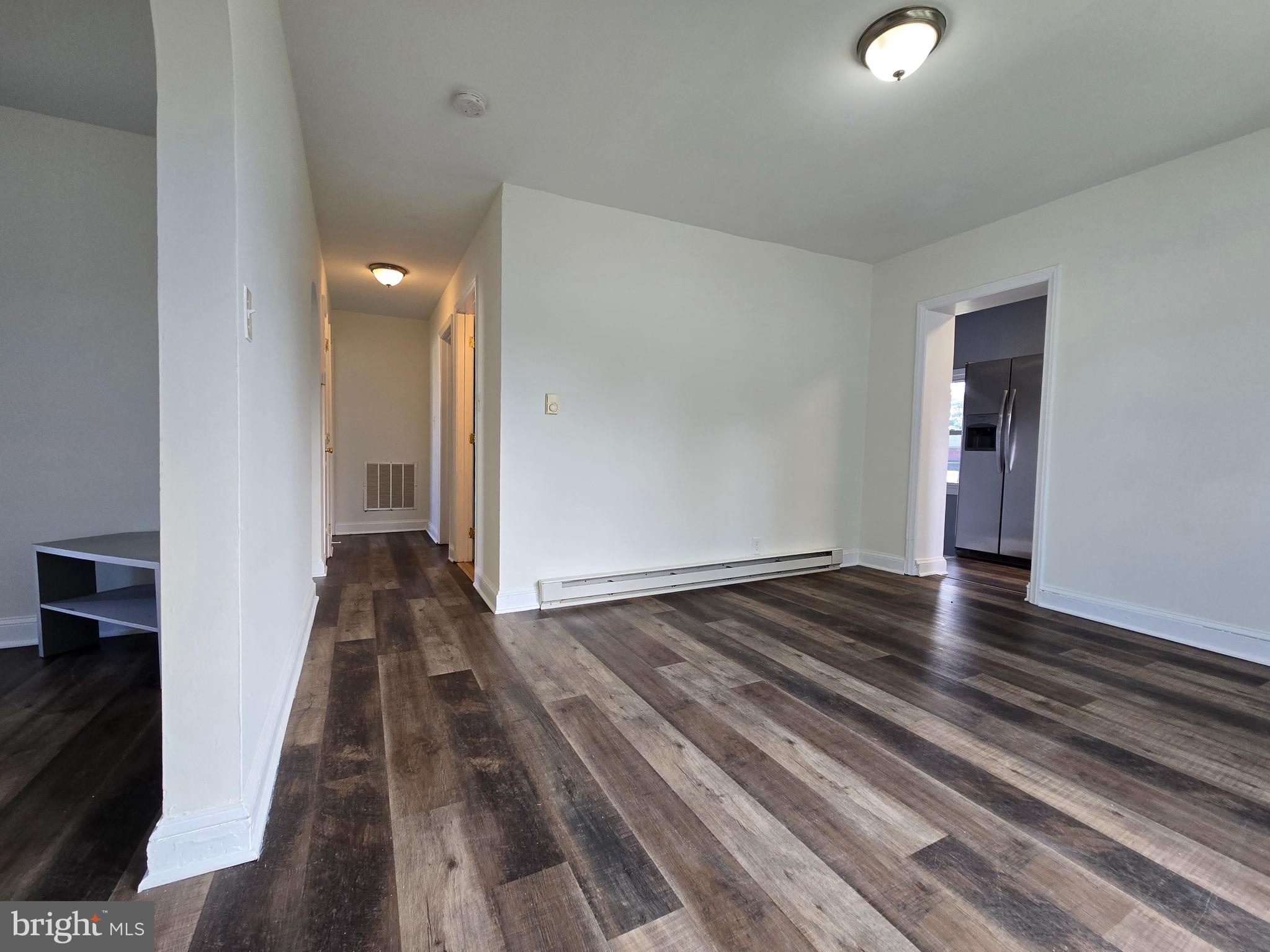 151 Riviera Drive Pasadena, MD 21122 - Photo 11 of 66 Apt Adining area, hallway to bedrooms