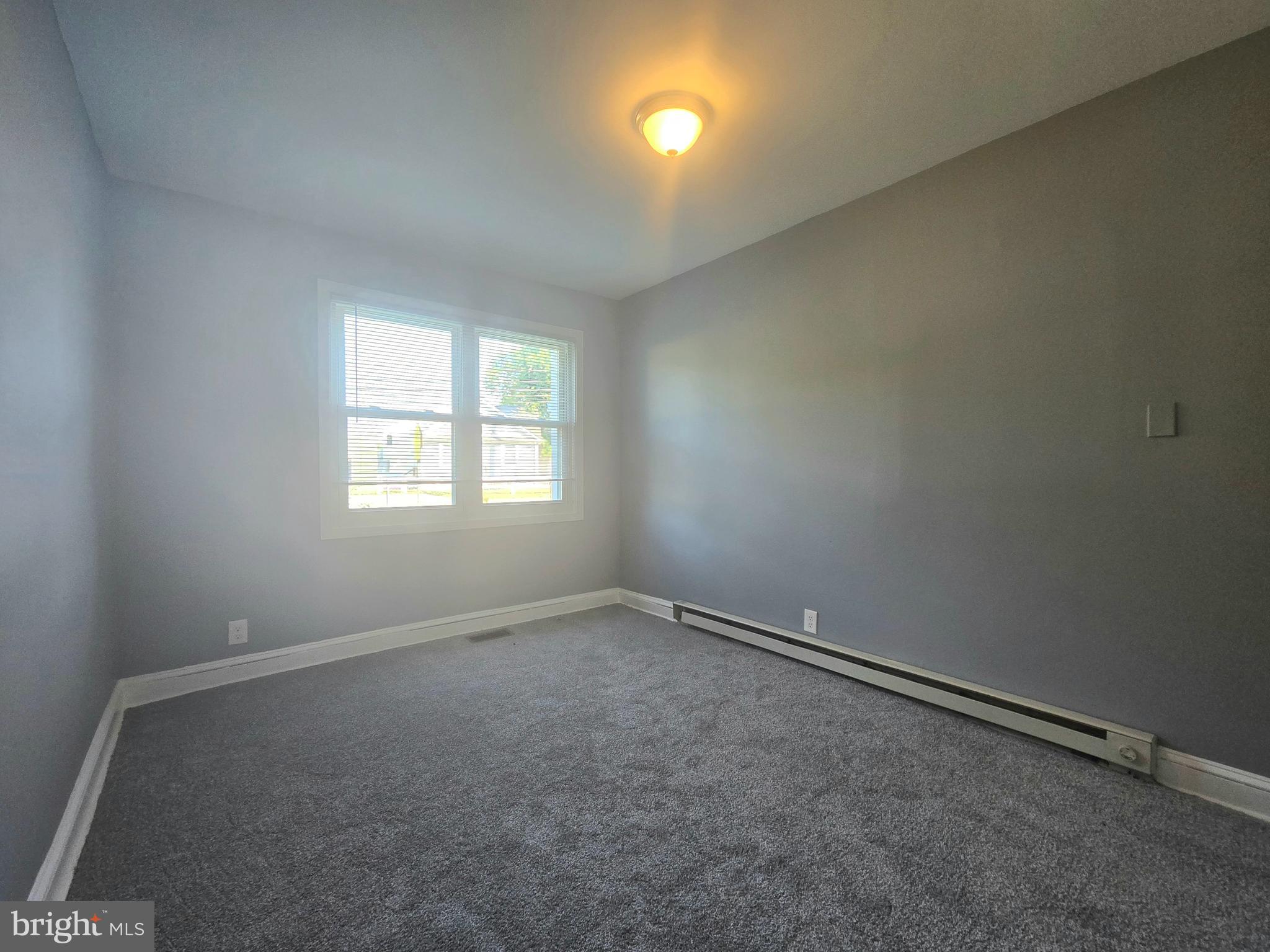 151 Riviera Drive Pasadena, MD 21122 - Photo 21 of 72 an empty room with a window