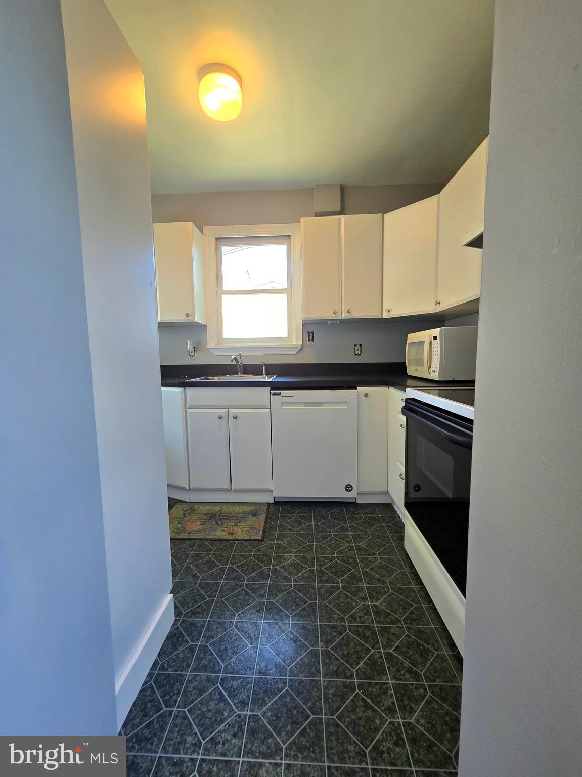 151 Riviera Drive Pasadena, MD 21122 - Photo 26 of 66 Unit B 8x11 kitchen with dishwasher