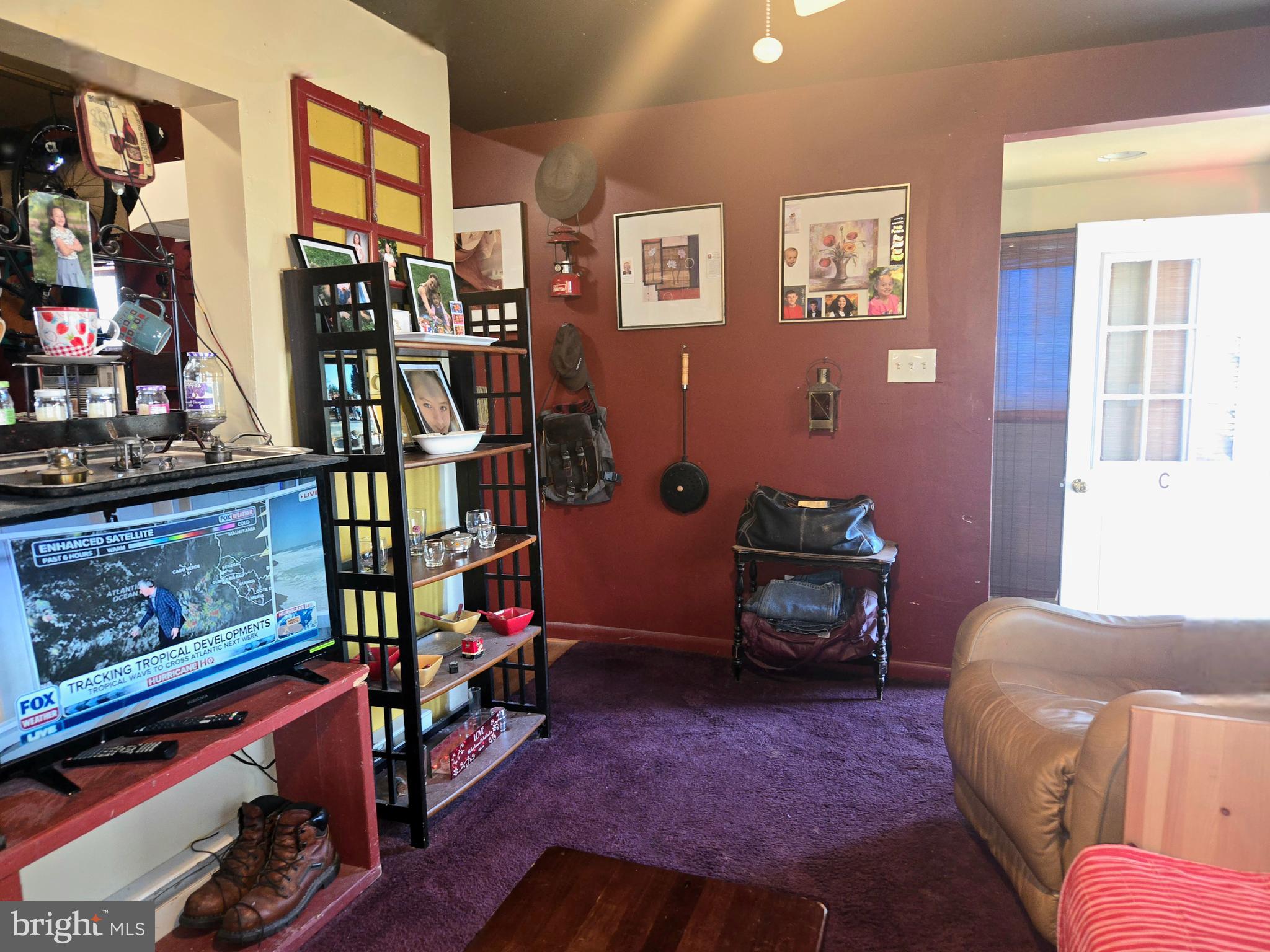 151 Riviera Drive Pasadena, MD 21122 - Photo 44 of 72 a bedroom with furniture and a book shelf