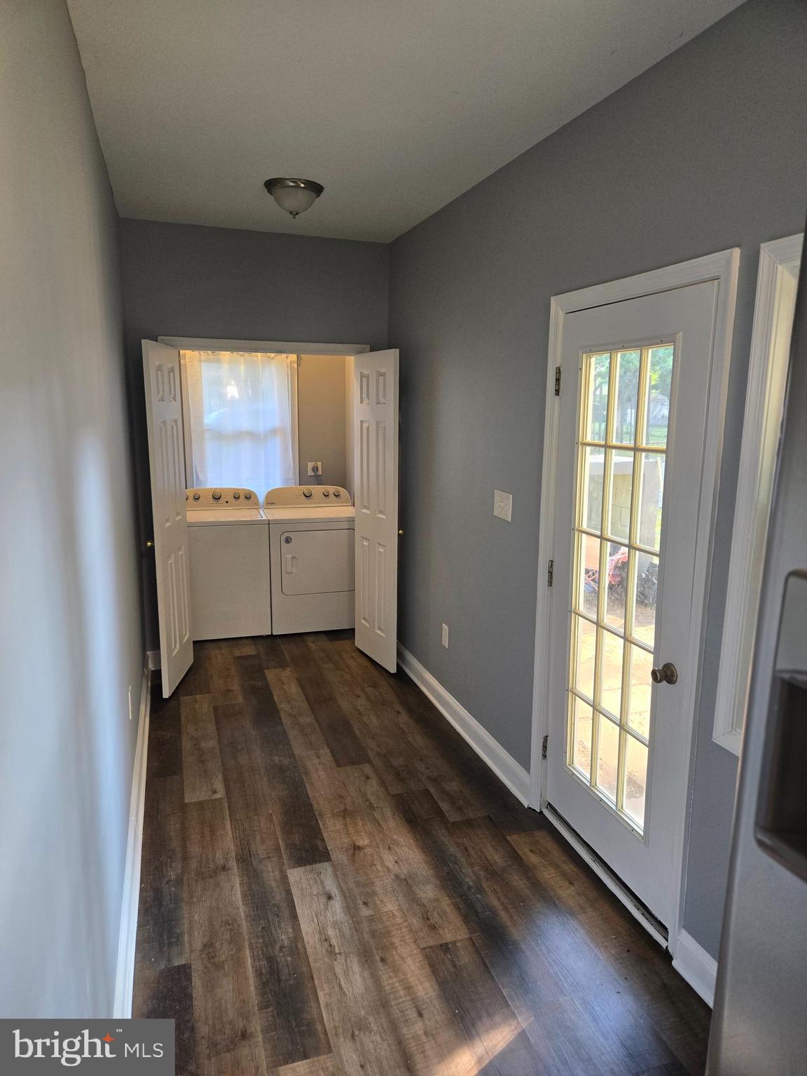 151 Riviera Drive Pasadena, MD 21122 - Photo 8 of 72 a room with window and chandelier