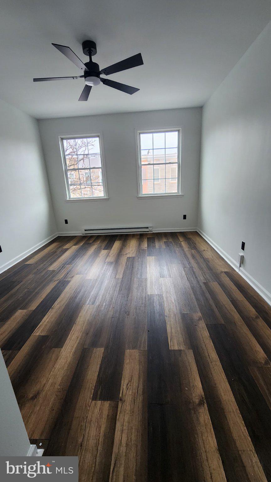 3502 East Lombard Street Baltimore, MD 21224 - Photo 5 of 10 a view of an empty room and window