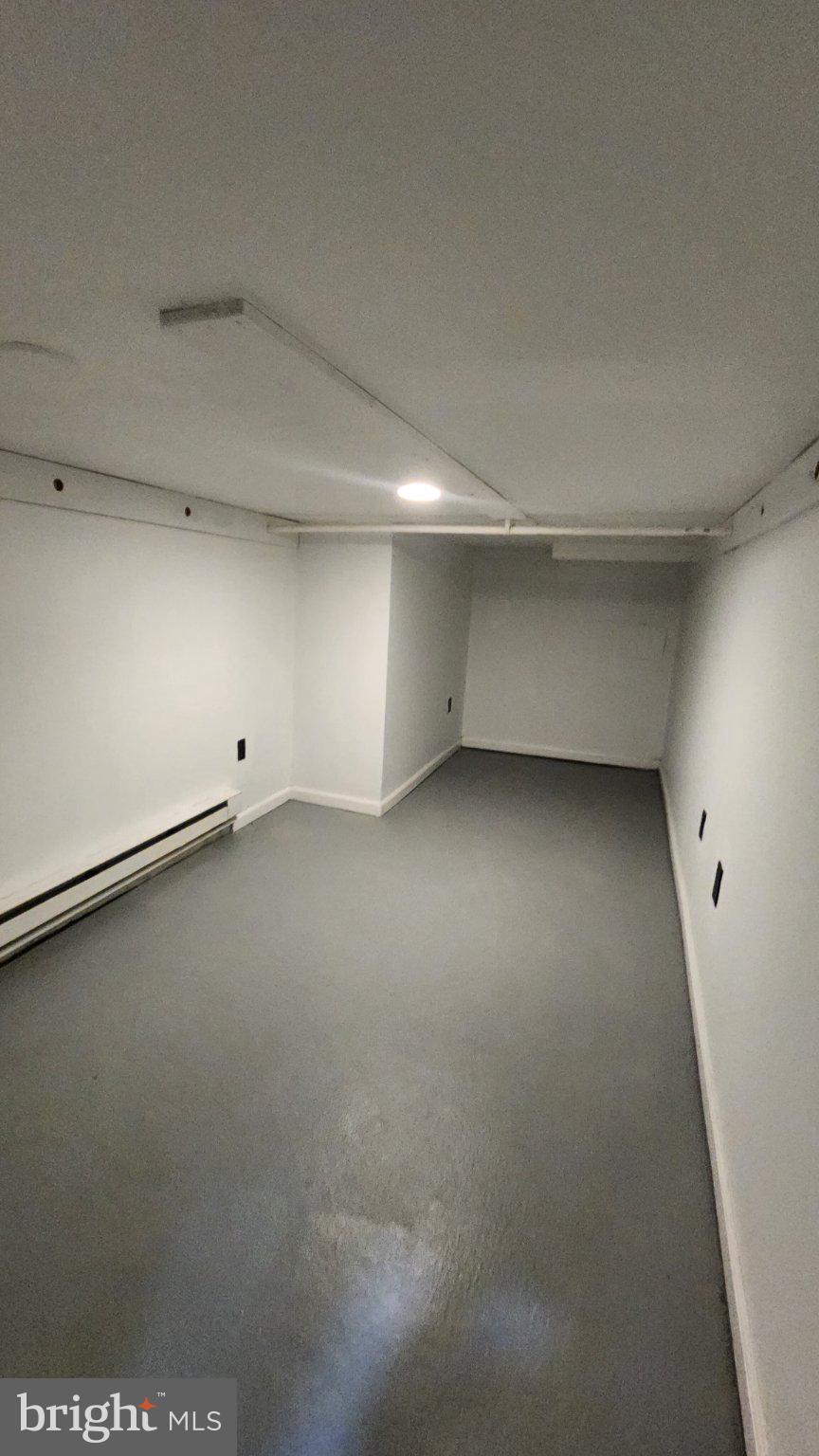 3502 East Lombard Street Baltimore, MD 21224 - Photo 7 of 10 an empty room with a empty space