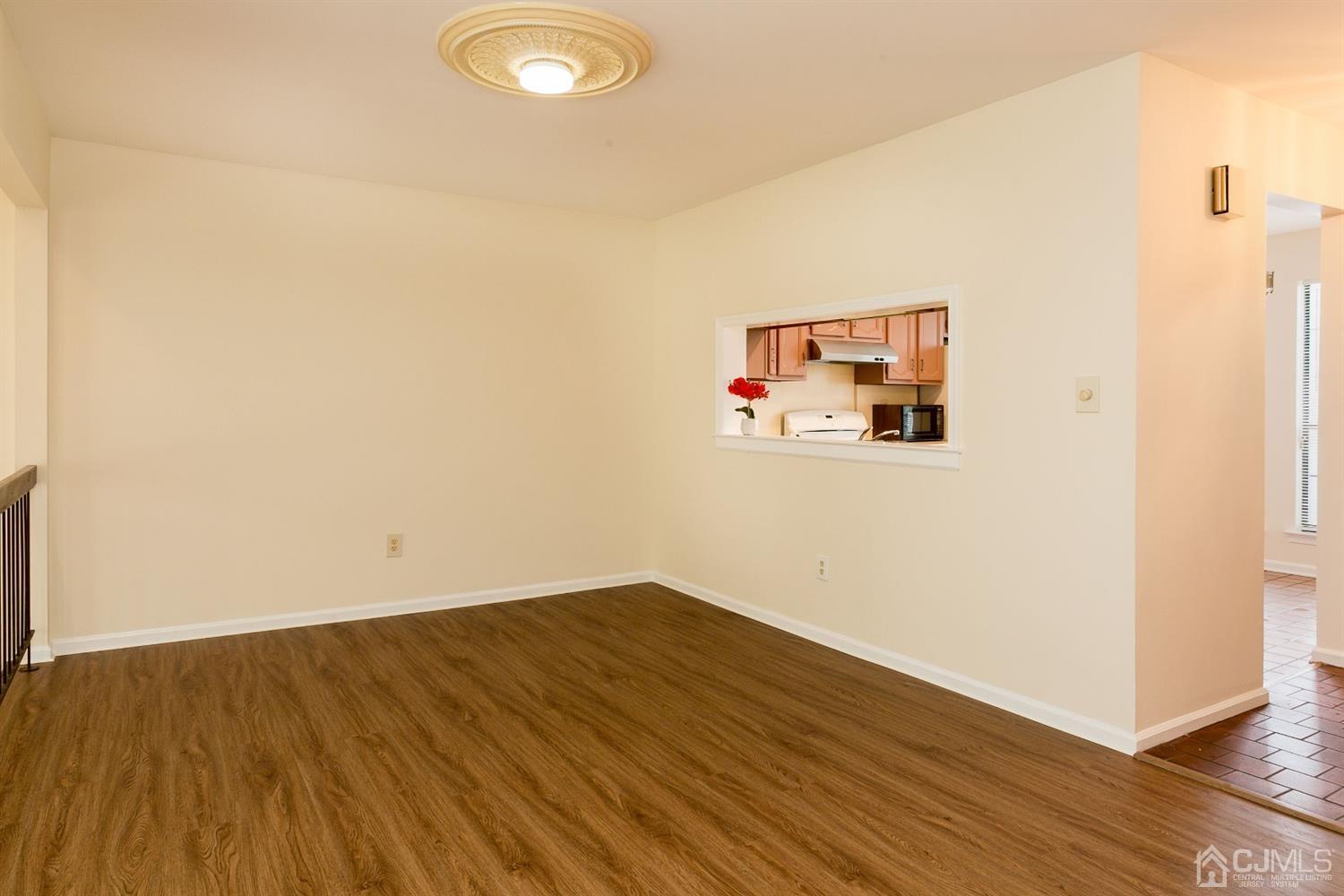 1307 Timber Oaks Road Edison, NJ 08820 - Photo 11 of 26 a view of a room with wooden floor