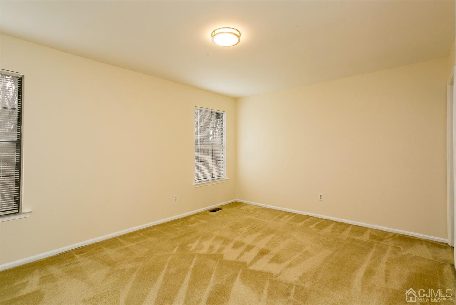 1307 Timber Oaks Road Edison, NJ 08820 - Photo 17 of 26 a view of a room with a window