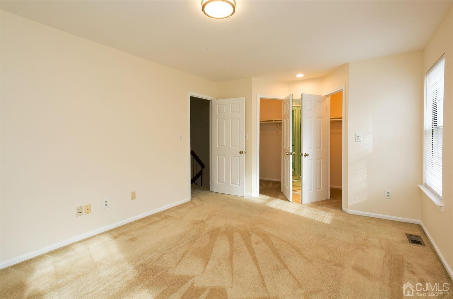 1307 Timber Oaks Road Edison, NJ 08820 - Photo 19 of 26 a view of a big room with windows and closet