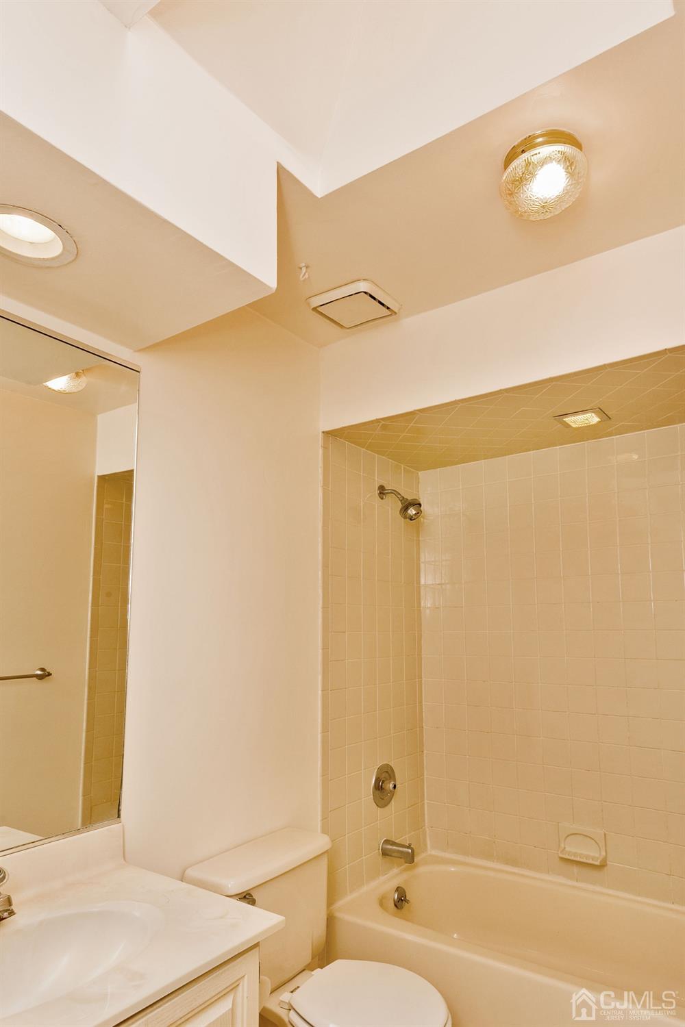 1307 Timber Oaks Road Edison, NJ 08820 - Photo 20 of 26 a bathroom with a sink and a mirror