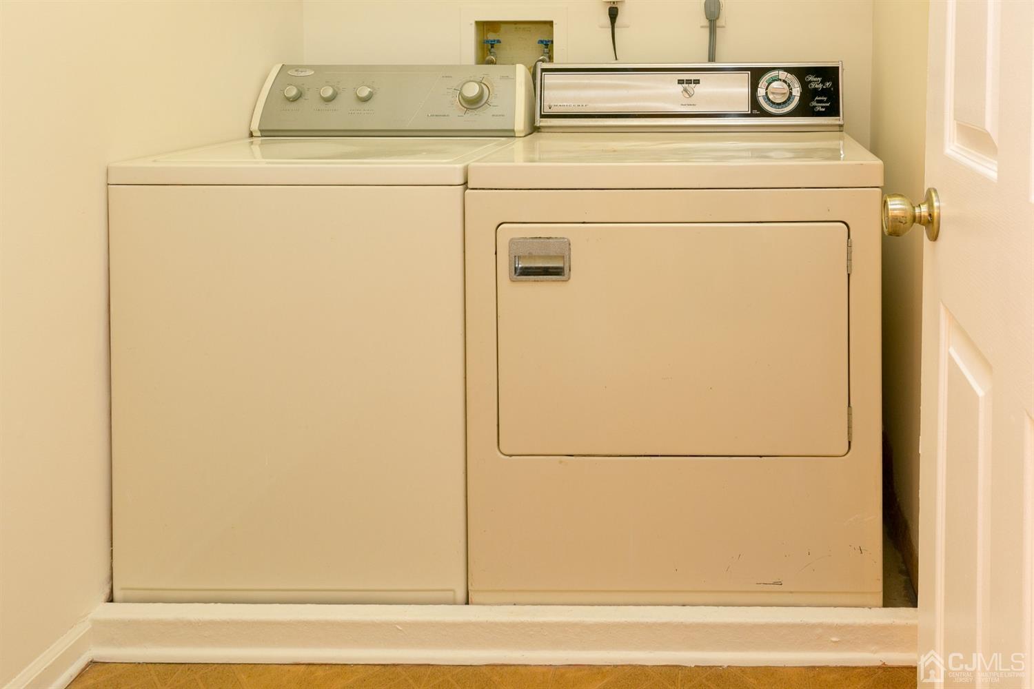 1307 Timber Oaks Road Edison, NJ 08820 - Photo 25 of 26 a utility room with dryer and washer