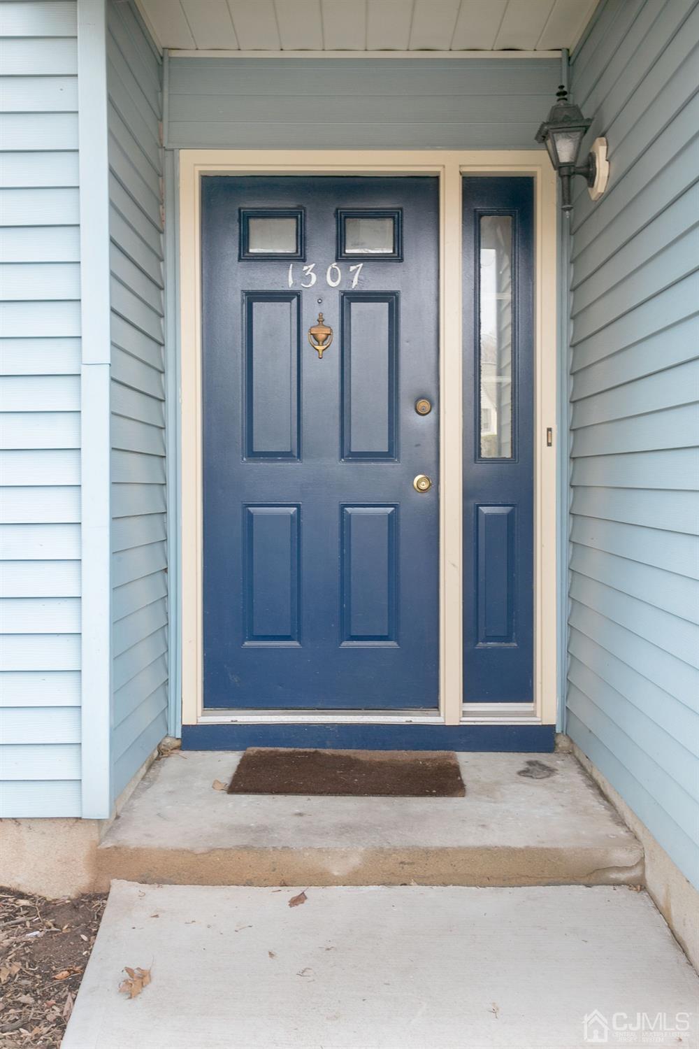 1307 Timber Oaks Road Edison, NJ 08820 - Photo 6 of 26 a view of entrance door of the house