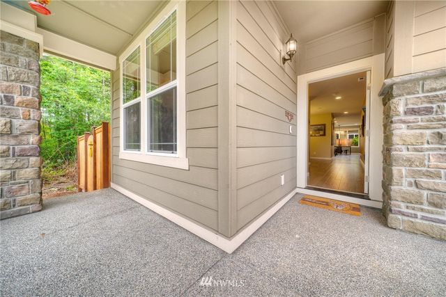 a view of a house with a street