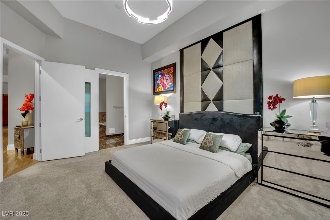 360 East Desert Inn Road, Unit 1803 Las Vegas, NV 89109 - Photo 28 of 67 Bedroom with carpet