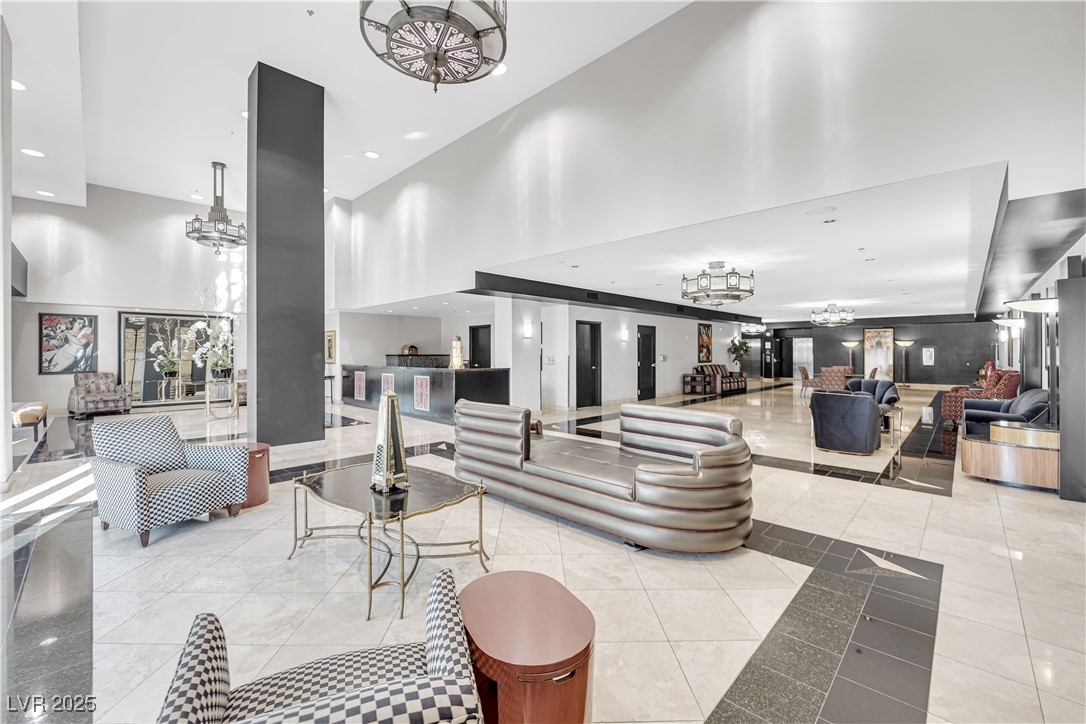 360 East Desert Inn Road, Unit 1803 Las Vegas, NV 89109 - Photo 57 of 67 Building lobby featuring a high ceiling and recessed lighting