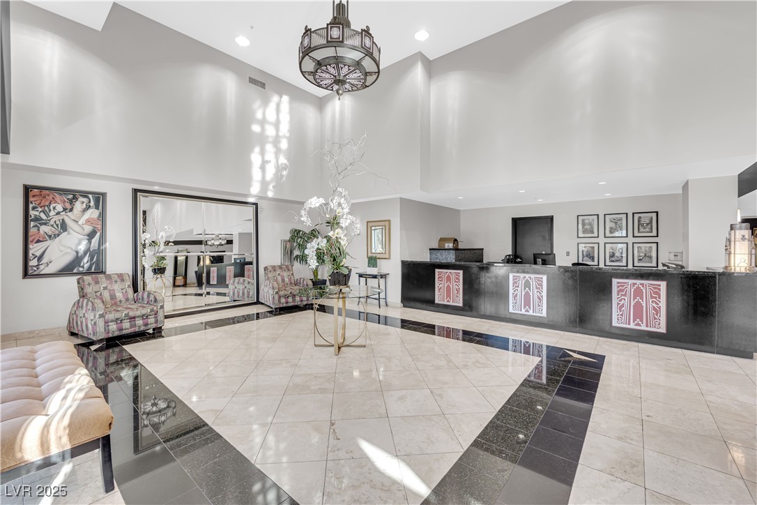 360 East Desert Inn Road, Unit 1803 Las Vegas, NV 89109 - Photo 58 of 67 Building lobby featuring a high ceiling and recessed lighting
