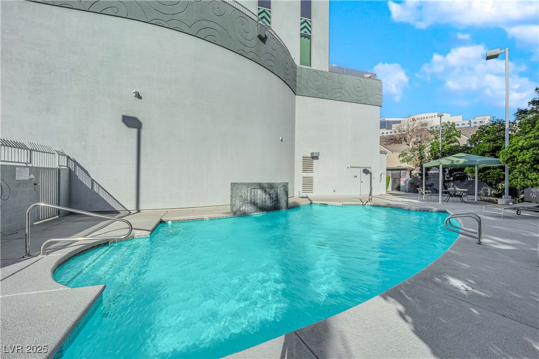 360 East Desert Inn Road, Unit 1803 Las Vegas, NV 89109 - Photo 62 of 67 Swimming pool with a patio
