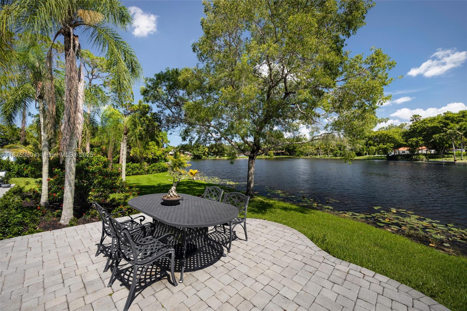 11000 Southwest 25th Street Davie, FL 33324 - Photo 38 of 45 a backyard of a house with outdoor seating