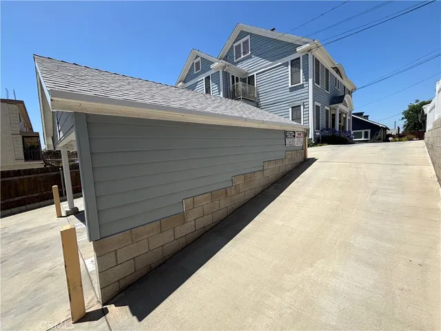 a terrace of a house with wooden fence