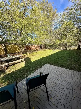 a view of a chairs and table on the terrace