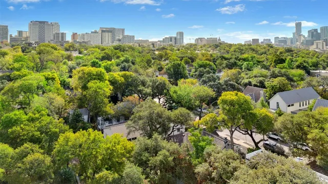 a view of a city with tall buildings