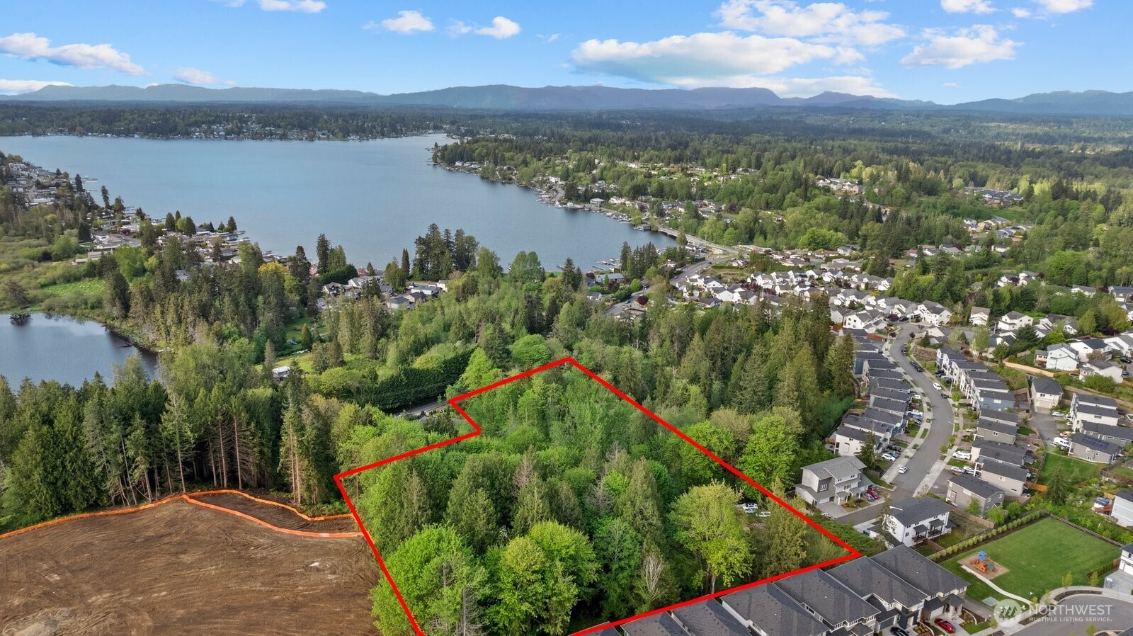 10928 South Lake Stevens Road Lake Stevens, WA 98258 - Photo 2 of 10 a view of a lake from a balcony